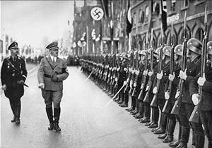 Hitler Marching Beside Troops